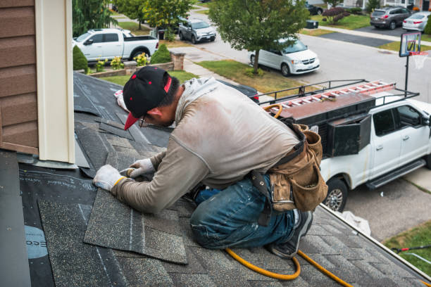 Professional Roofing technician working in Millington, MI